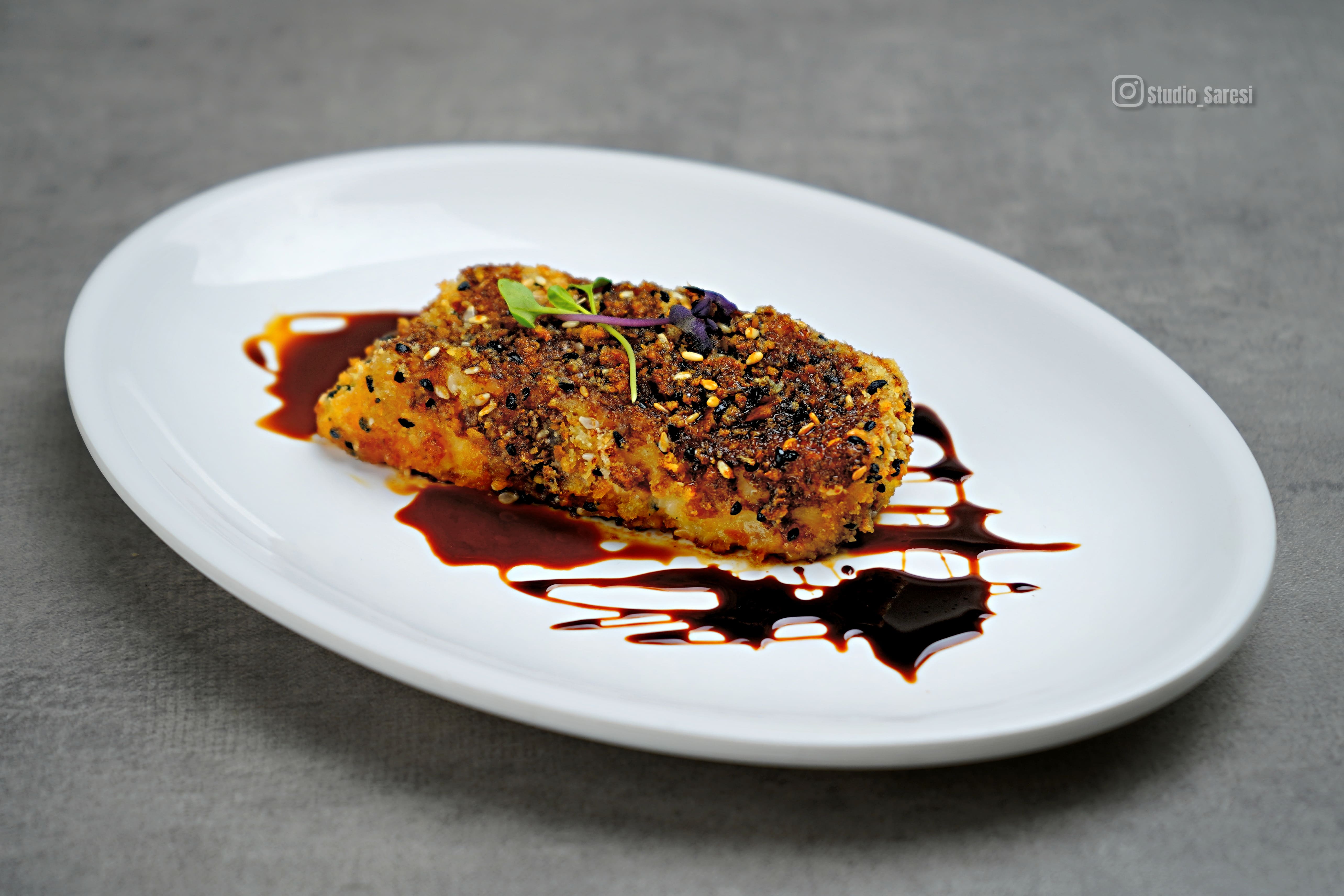 Halloumi with Sesame and Carob Syrup